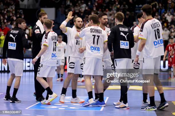 The team of Germany comes together after the international handball friendly match between Germany and Hungary at Schwalbe Arena on March 19, 2022 in...