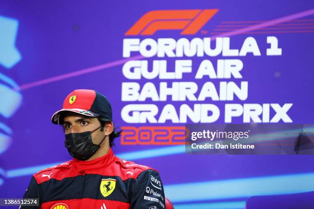 Third place qualifier Carlos Sainz of Spain and Ferrari talks in the press conference after qualifying ahead of the F1 Grand Prix of Bahrain at...