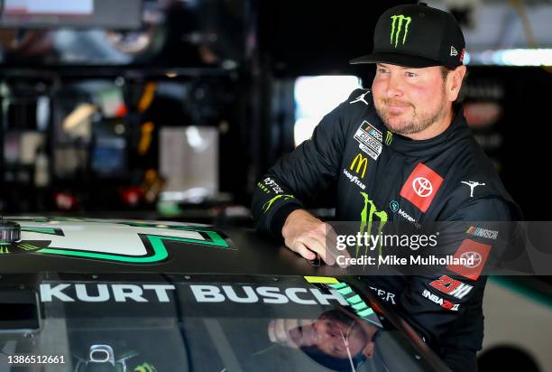 Kurt Busch, driver of the Monster Energy Toyota, enters his car in the garage area during practice for the NASCAR Cup Series Folds of Honor QuikTrip...