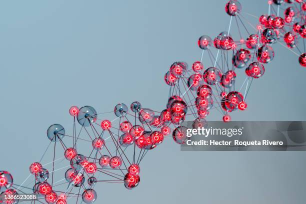 3d render of  red molecular structure on blue background - physical structure stockfoto's en -beelden