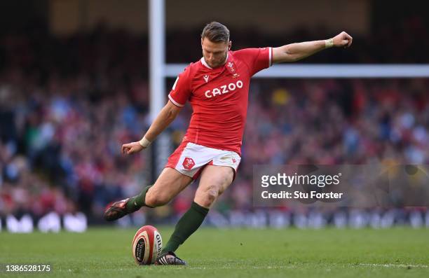 Wales player Dan Biggar kicks a penal during the Six Nations Rugby match between Wales and Italy at Principality Stadium on March 19, 2022 in...