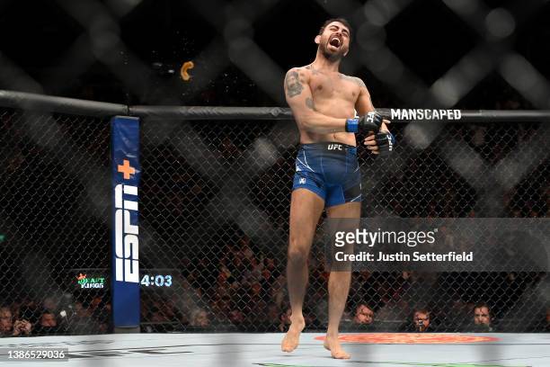 Makwan Amirkhani throws his gum shield after beating Mike Grundy during UFC Fight Night: Volkov v Aspinall at the The O2 Arena on March 19, 2022 in...