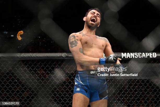Makwan Amirkhani throws his gum shield after beating Mike Grundy during UFC Fight Night: Volkov v Aspinall at the The O2 Arena on March 19, 2022 in...