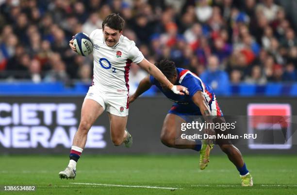 George Furbank of England is challenged by Jonathan Danty of France during the Guinness Six Nations Rugby match between France and England at Stade...
