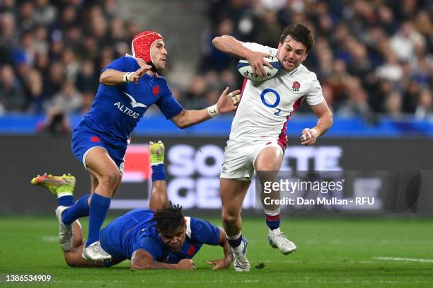 George Furbank of England evades the tackle attempt from Jonathan Danty of France during the Guinness Six Nations Rugby match between France and...