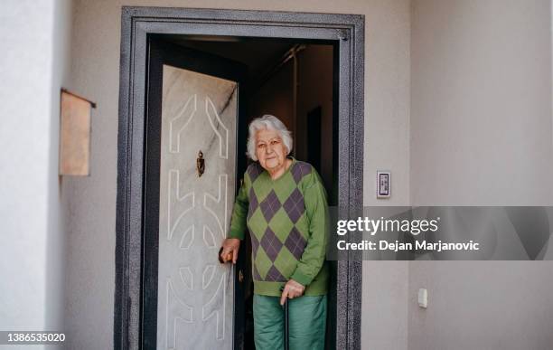 old people at home - old person with walking stick outside standing stock pictures, royalty-free photos & images