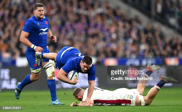 Julien Marchand of France is challenged by Sam Underhill of England during the Guinness Six Nations Rugby match between France and England at Stade...