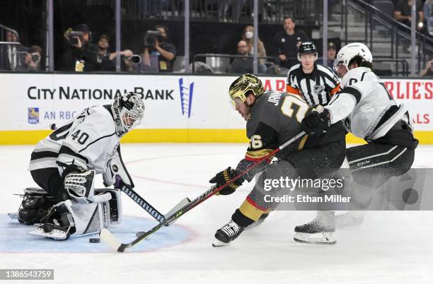 Mattias Janmark of the Vegas Golden Knights scores a short-handed goal against Cal Petersen of the Los Angeles Kings as Sean Durzi of the Kings...