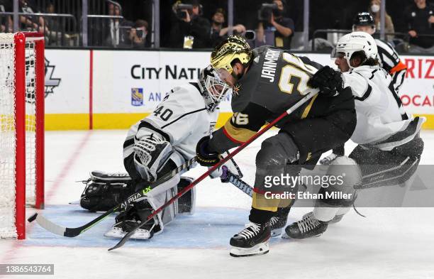 Mattias Janmark of the Vegas Golden Knights scores a short-handed goal against Cal Petersen of the Los Angeles Kings as Sean Durzi of the Kings...