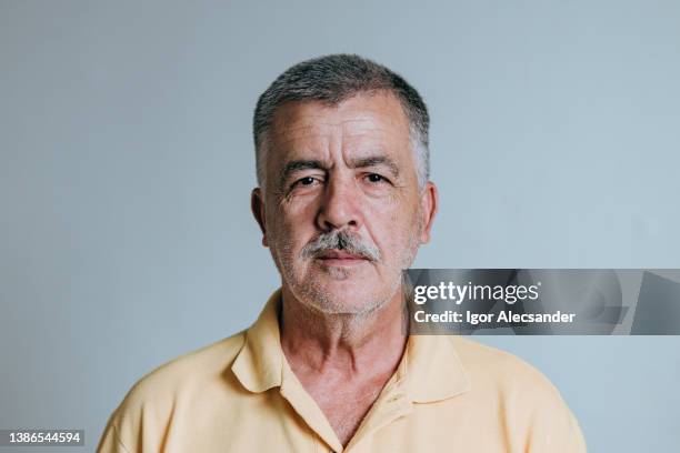 portrait of a mature man looking at camera - moustache isolated stock pictures, royalty-free photos & images