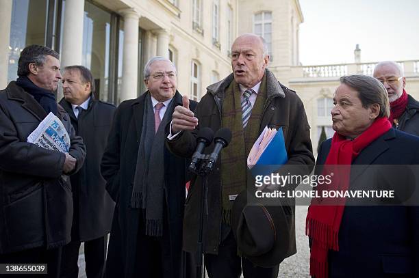 Aquitaine region socialist President Alain Rousset speaks to the press next to other socialist authorities, the President of the National Assembly...