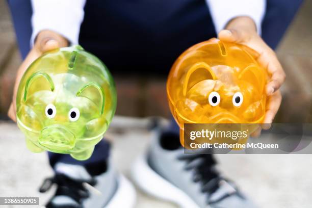 public policy debate: cost of raising children generally & education specifically in united states - subsidy stock pictures, royalty-free photos & images