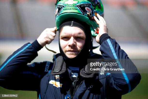 Conor Daly, driver of the BitNile Chevrolet, prepares to drive during qualifying for the NTT IndyCar Series XPEL 375 at Texas Motor Speedway on March...