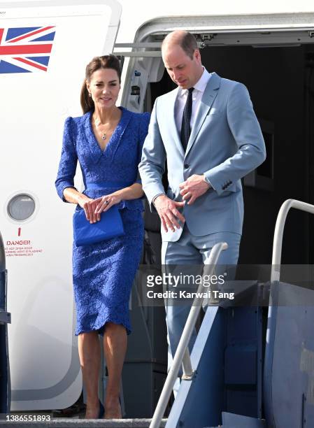 Catherine, Duchess of Cambridge and Prince William, Duke of Cambridge onboard the Voyager arrives at Philip S. W Goldson International Airport to...
