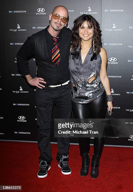 Dennis White aka Static Revenger and Charissa Saverio aka DJ Rap arrive at the Los Angeles premiere of "Re:Generation Music Project" held at...