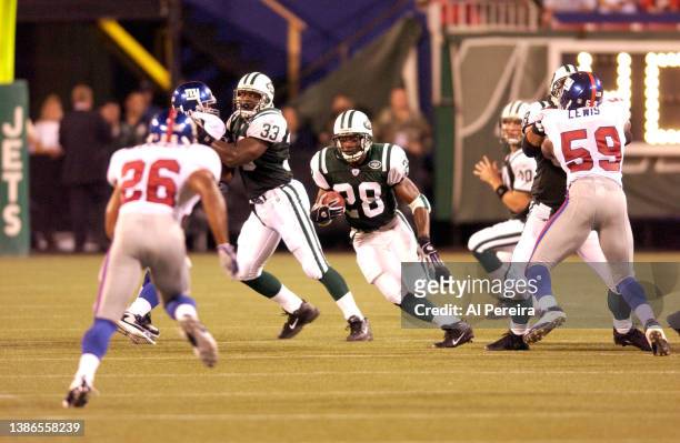 Running Back Curtis Martin of the New York Jets is shown in action during the New York Giants vs New York Jets game at The Meadowlands on August 27,...