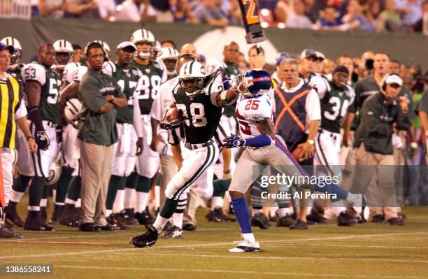 Running Back Curtis Martin of the New York Jets is shown in action during the New York Giants vs New York Jets game at The Meadowlands on August 27,...