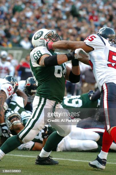 Center Kevin Mawae of the New York Jets is shown in action during the Houston Texans vs New York Jets game at The Meadowlands on December 5, 2004 in...