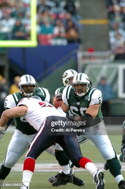 Center Kevin Mawae of the New York Jets is shown in action during the Houston Texans vs New York Jets game at The Meadowlands on December 5, 2004 in...