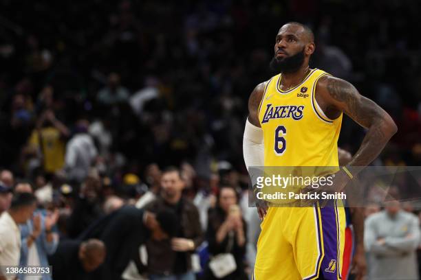 LeBron James of the Los Angeles Lakers looks on after scoring against the Washington Wizards during the second quarter at Capital One Arena on March...