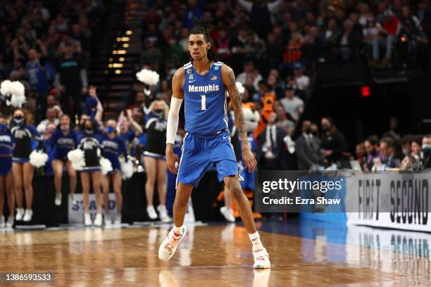 Emoni Bates of the Memphis Tigers reacts after making a shot during the first half against the Gonzaga Bulldogs in the second round of the 2022 NCAA...