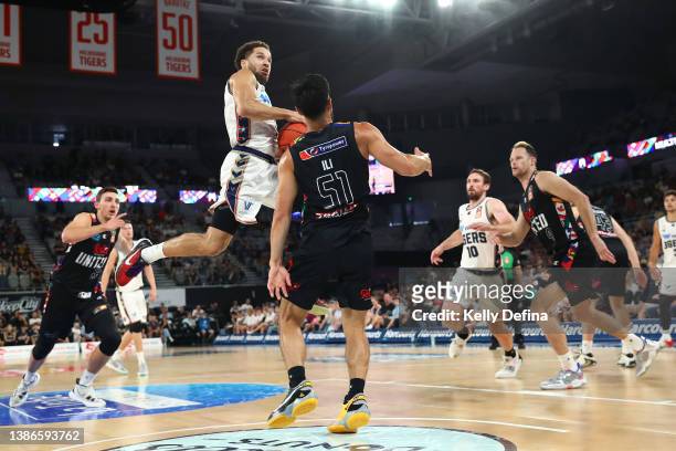 Tad Dufelmeier of the 36ers in in action against Shea Ili of United during the round 16 NBL match between Melbourne United and Adelaide 36ers at John...