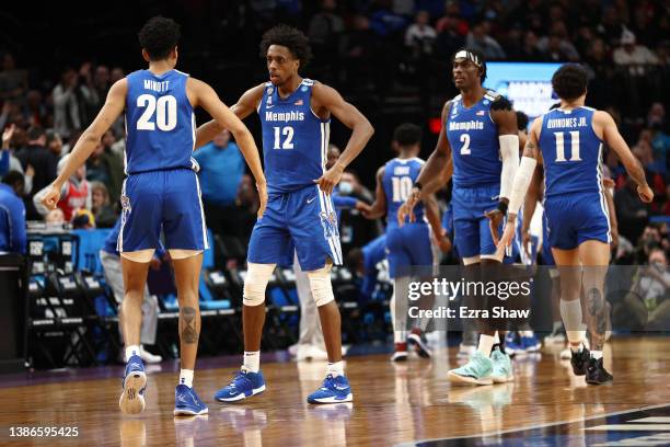 Josh Minott of the Memphis Tigers celebrates with DeAndre Williams after a timeout is called during the first half against the Gonzaga Bulldogs in...