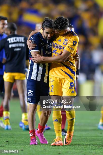 Igor Lichnovsky of Tigres hugs Rodolfo Pizarro of Monterrey at the end of the 11th round match between Tigres UANL and Monterrey as part of the...