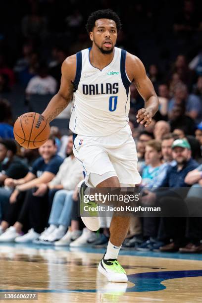 Sterling Brown of the Dallas Mavericks brings the ball up court against the Charlotte Hornets during their game at Spectrum Center on March 19, 2022...