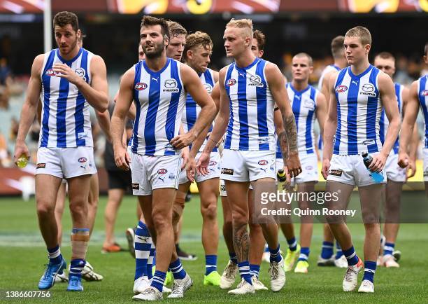 The Kangaroos look dejected after losing the round one AFL match between the Hawthorn Hawks and the North Melbourne Kangaroos at Melbourne Cricket...