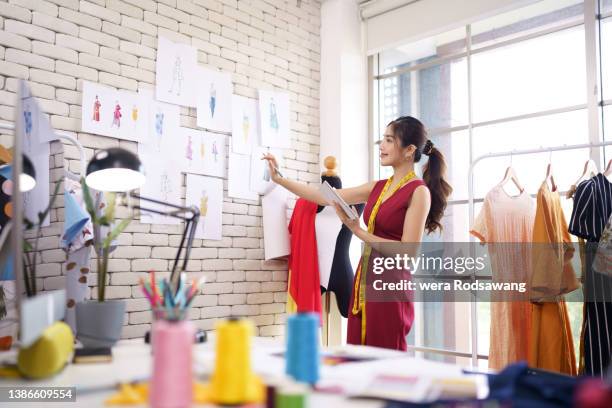 fashion designer on inspiration to create and design clothing - kostümbildner stock-fotos und bilder