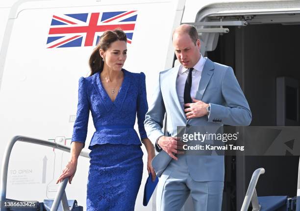 Catherine, Duchess of Cambridge and Prince William, Duke of Cambridge arrive at Philip S. W Goldson International Airport to start their Royal Tour...
