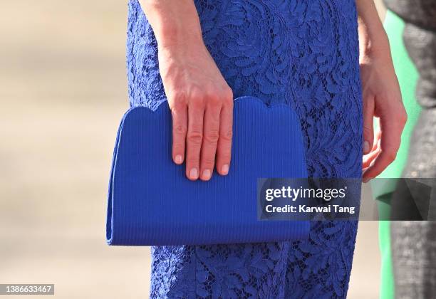 Catherine, Duchess of Cambridge, bag detail, arrives at Philip S. W Goldson International Airport with Prince William, Duke of Cambridge to start...