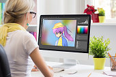 Animator drawing a portrait in image editing software