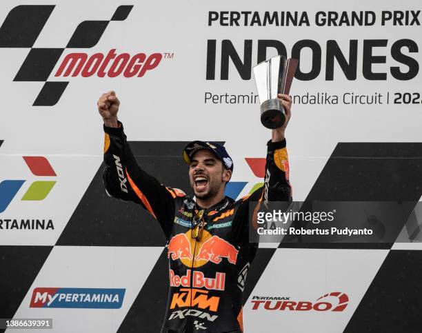 MotoGP rider Miguel Oliveira of Portugal and Red Bull KTM Factory Racing celebrates with the trophy during the victory ceremony after winning the...