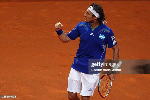 Juan Monaco of Argentina celebrates during his match against Philipp Petzschner of Germany on day 1 of the Davis Cup World Group first round match...