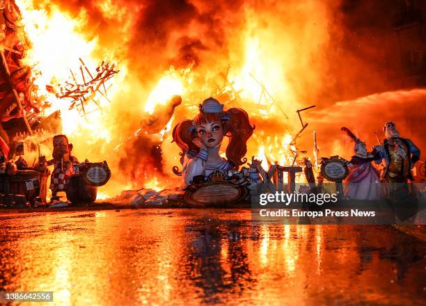 Falla, of a girl with pigtails and dressed as a sailor, is burned during the Crema, on 20 March, 2022 in Valencia, Valencian Community, Spain. The...