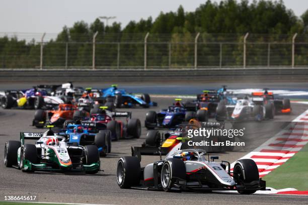 Juri Vips of Estonia and Hitech Grand Prix leads the field round turn two at the start during the Round 1:Sakhir Feature Race of the Formula 2...