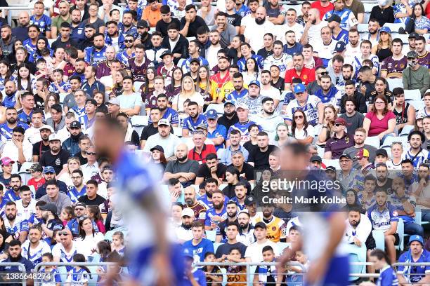 The crowd watches on during the round two NRL match between the Canterbury Bulldogs and the Brisbane Broncos at Accor Stadium, on March 20 in Sydney,...