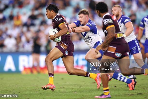 Selwyn Cobbo of the Broncos runs the ball during the round two NRL match between the Canterbury Bulldogs and the Brisbane Broncos at Accor Stadium,...
