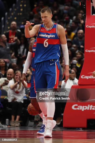 Kristaps Porzingis of the Washington Wizards celebrates against the Los Angeles Lakers at Capital One Arena on March 19, 2022 in Washington, DC. NOTE...