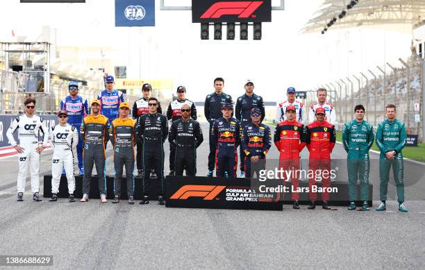 The F1 Class of 2022 drivers pose for a photo on track before the F1 Grand Prix of Bahrain at Bahrain International Circuit on March 20, 2022 in...