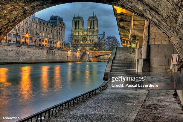 notre-dame - river seine stock pictures, royalty-free photos & images