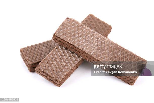 chocolate waffles on white background - wafeltje stockfoto's en -beelden