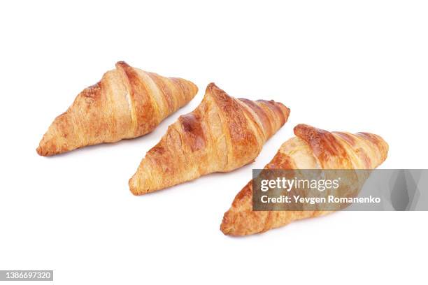 fresh crusty croissants isolated on white background - plate side view stock pictures, royalty-free photos & images