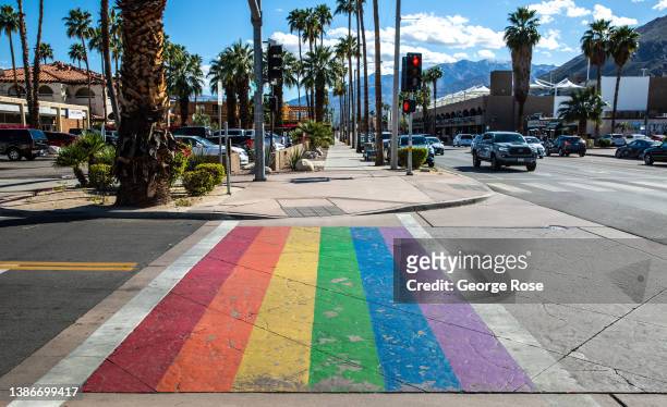 The street pedestrian crossing is painted in rainbow colors as viewed on March 7, 2022 in Palm Springs, California. Palm Springs is a city of nearly...