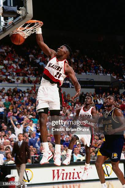 Jerome Kersey of the Portland Trailblazers dunks against the Indiana Pacers during a game played circa 1991 at the Veterans Memorial Coliseum in...