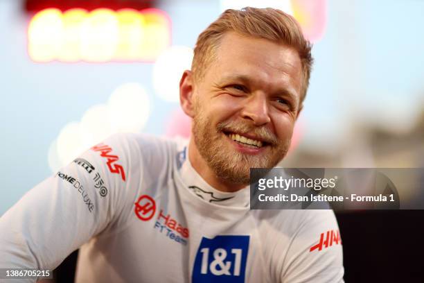 Kevin Magnussen of Denmark and Haas F1 looks on from the grid prior to the F1 Grand Prix of Bahrain at Bahrain International Circuit on March 20,...