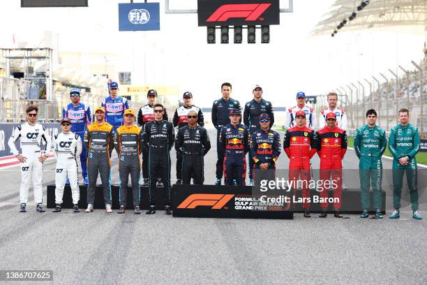 The F1 Class of 2022 drivers pose for a photo on track before the F1 Grand Prix of Bahrain at Bahrain International Circuit on March 20, 2022 in...
