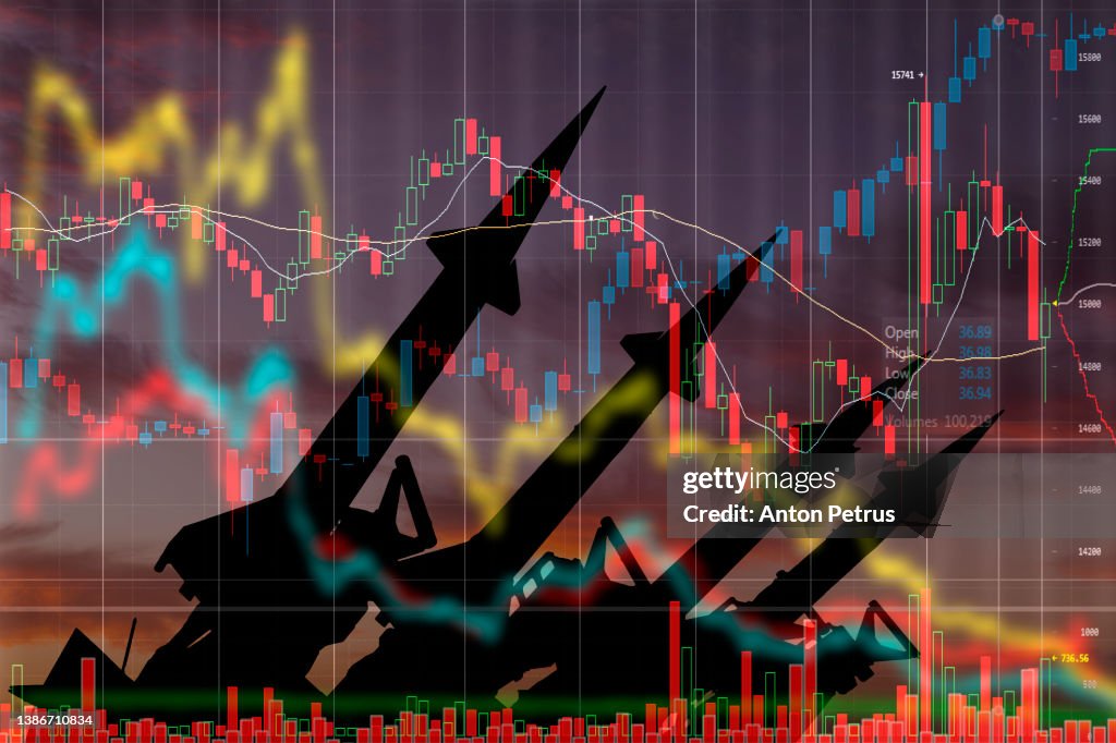 Missiles on the background of stock charts. Economic crisis due to war